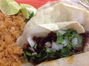 Tacos with rice and beans.